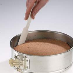 Racleur/détacheur à gâteau